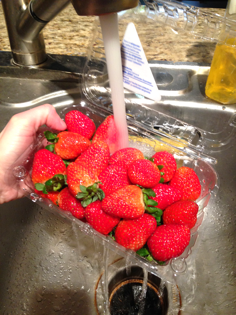 washing strawberries